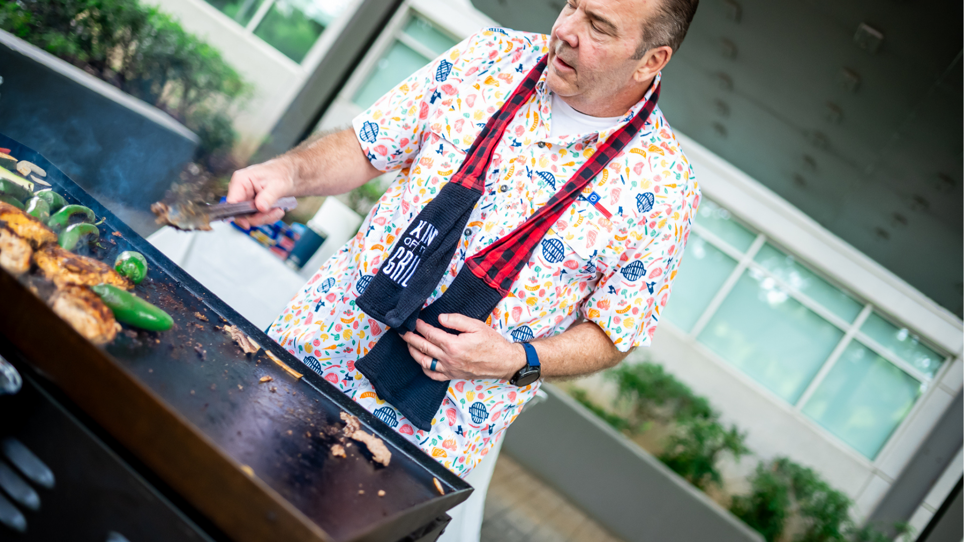 advancial's chief information officer grilling fajitas at an advancial social